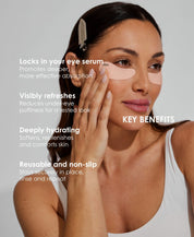 Ohra Self Made Eye Mask key benefits, de-puffs and hydrates in 20 minutes. A woman with under-eye patches applies or touches her eye area while text on a light gray background lists key benefits such as locking in eye serum, reducing puffiness, hydrating skin, and being reusable.