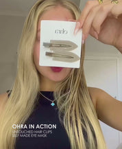 Video of blonde woman applying the Ohra Self Made Eye Mask and Ohra Untouched Hair Clips in Smokey during her routine